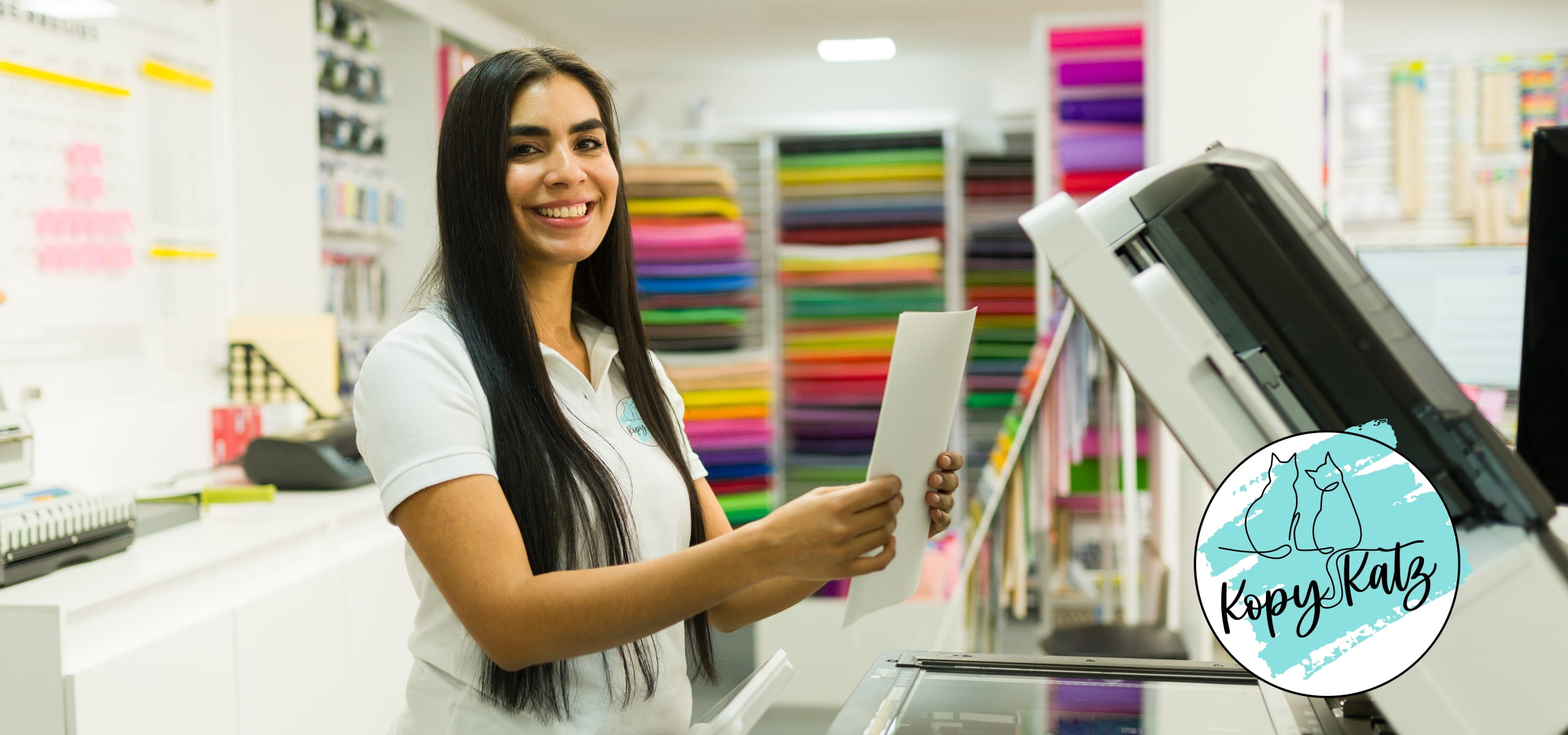 Employee working at a copy machine.